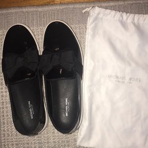 Michael Kors Collection patent leather sneakers.